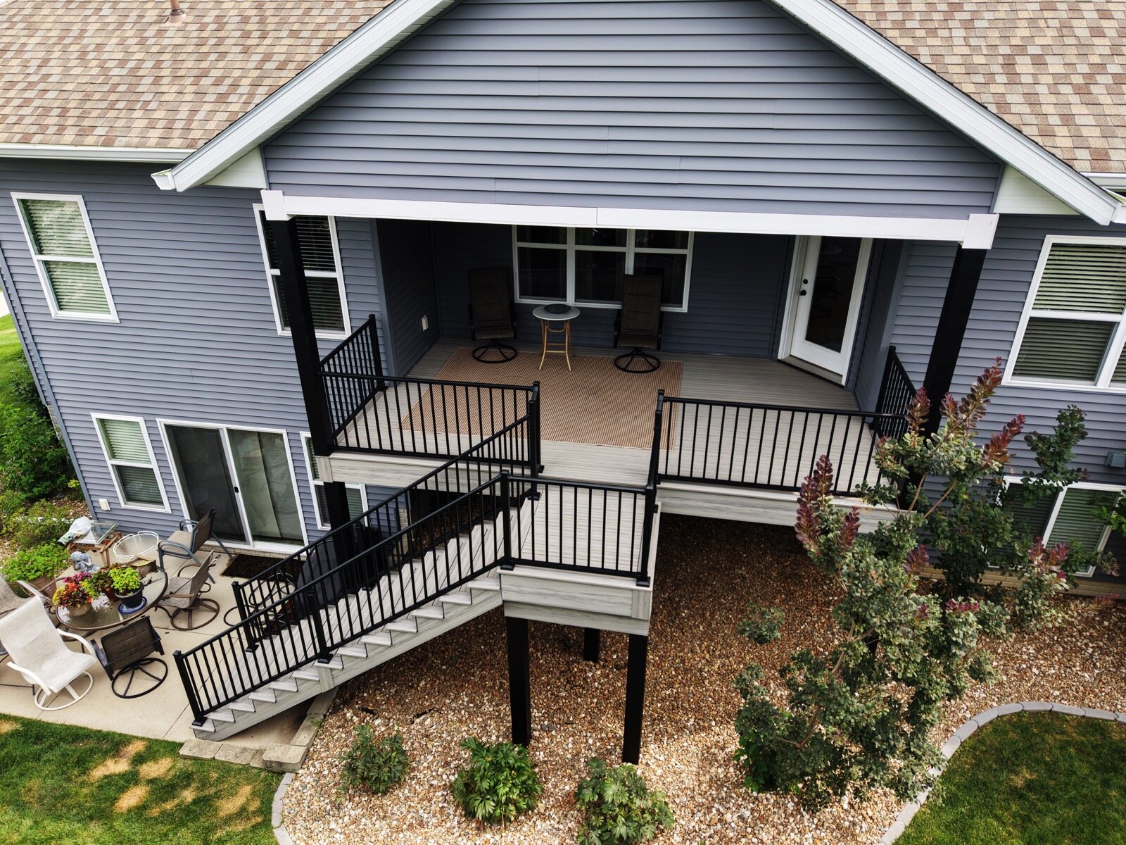 Custom composite deck in North Liberty Iowa by T&T Home Improvement