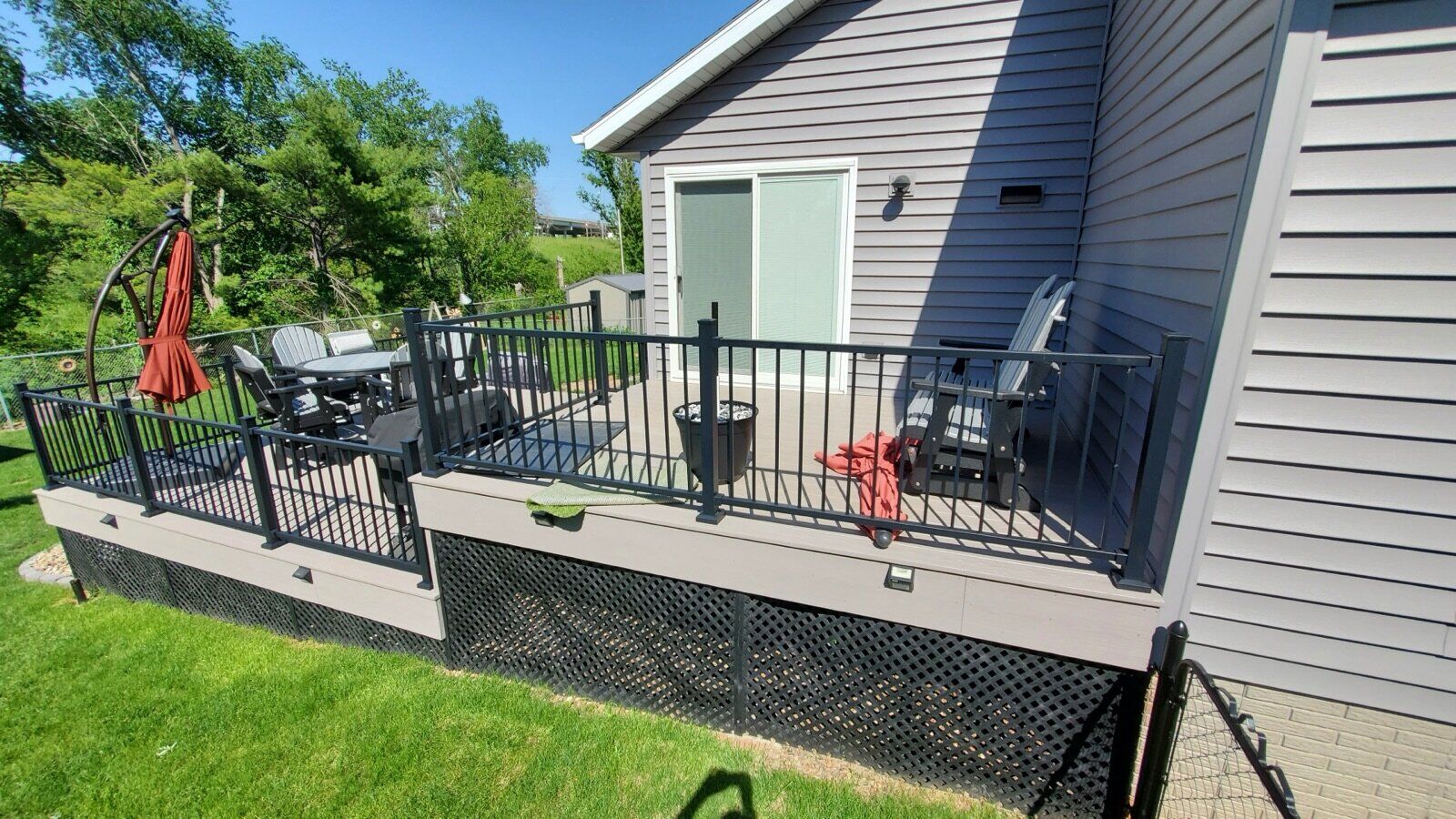 Finished composite deck with railing in Cedar Rapids Iowa