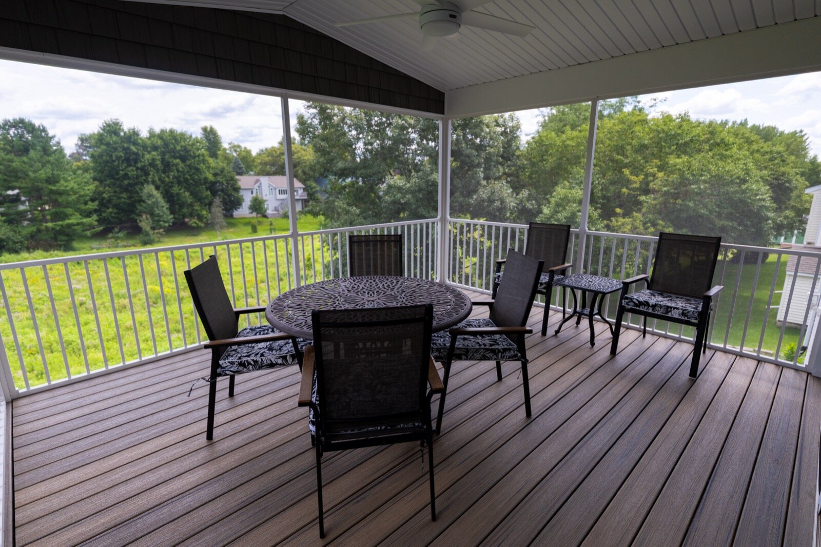 Screen room interior in Coralville Iowa by T&T Home Improvement